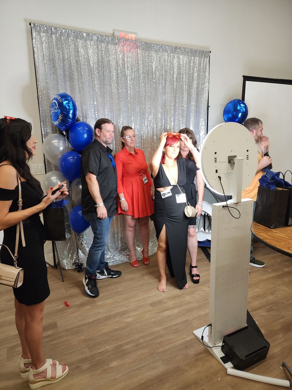 Guests lying in a line for a fun selfie station group photo