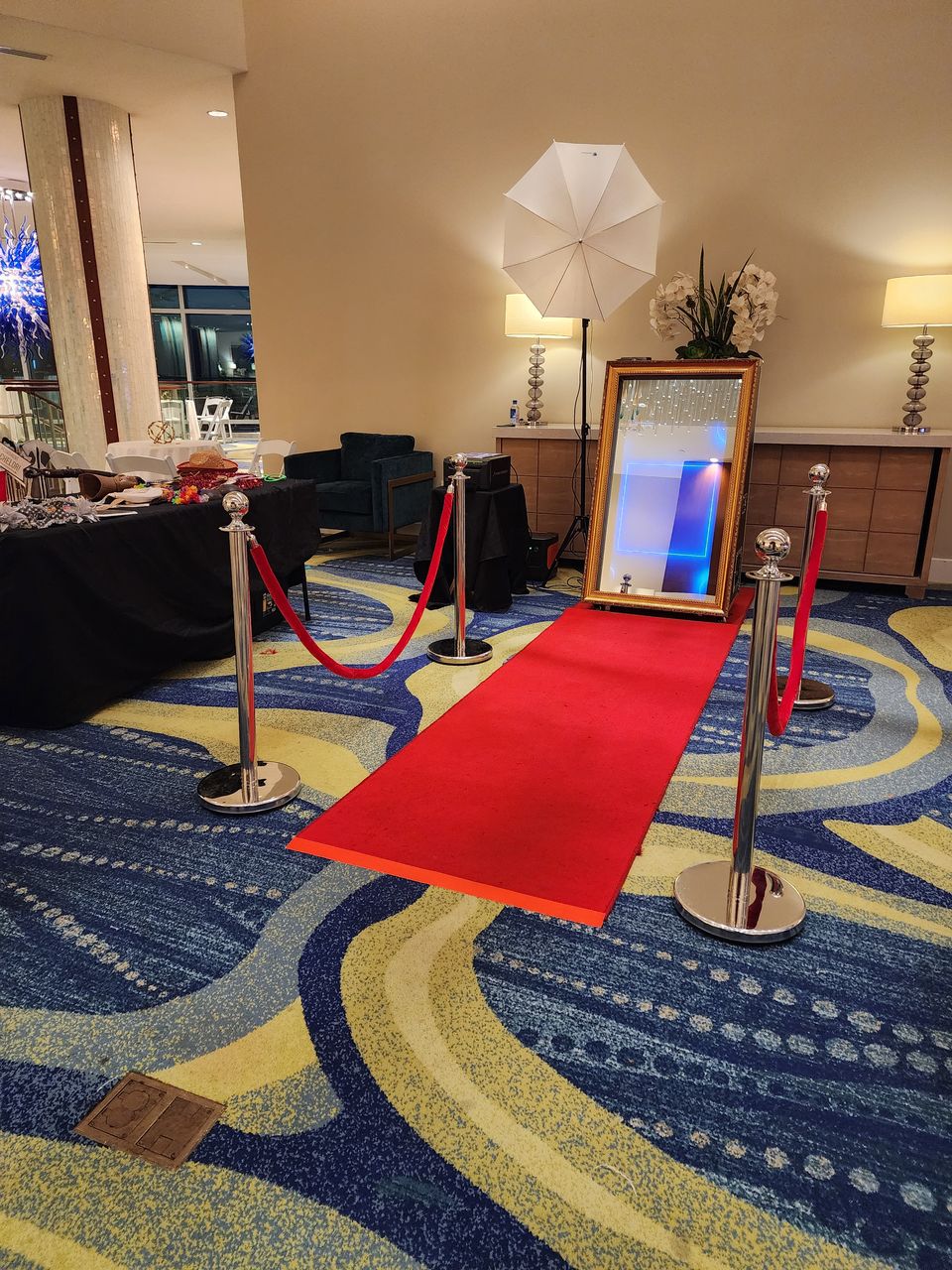 Magic Mirror photo booth set up at a movie-themed corporate event
