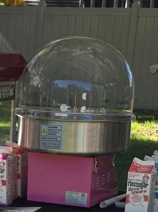 Cotton candy machine with spinning head and dome cover